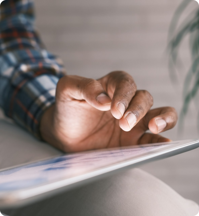 Person on their iPad searching information to help make a more informed decision.