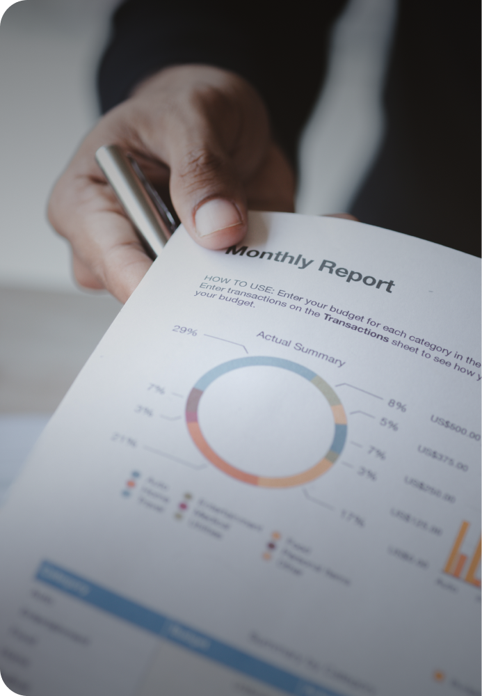 A printed sheet of paper with charts and graphs on it in multiple different, branded VitalGrid colors. These charts & graphs play a role in helping users understand VitalGrid's  data.