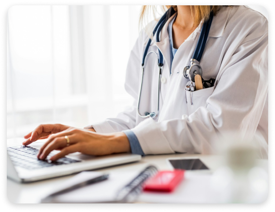 Young woman physician on their laptop, looking up necessary information to make better care decisions.